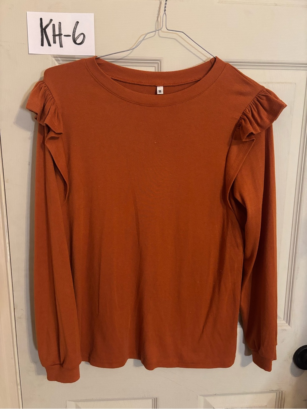 Women's Rust Ruffle Shoulder Long-Sleeve Top